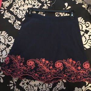 Miami navy skirt with floral detail. Size S.